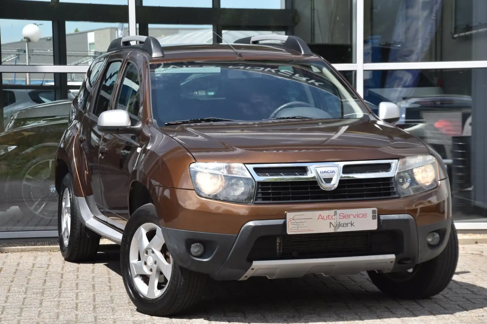 Dacia Duster 1.6 Lauréate Airco Pdc Trekhaak Youngtimer 1ste Ei Bruin - 1