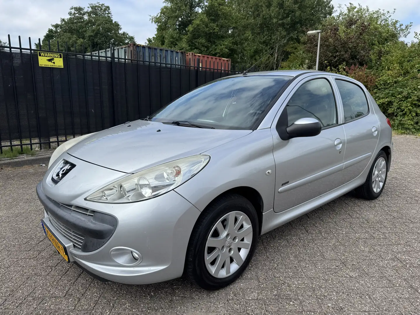 Peugeot 206 + 1.4 Sportium 5 Drs AC/Cruise/LMV Grijs - 1