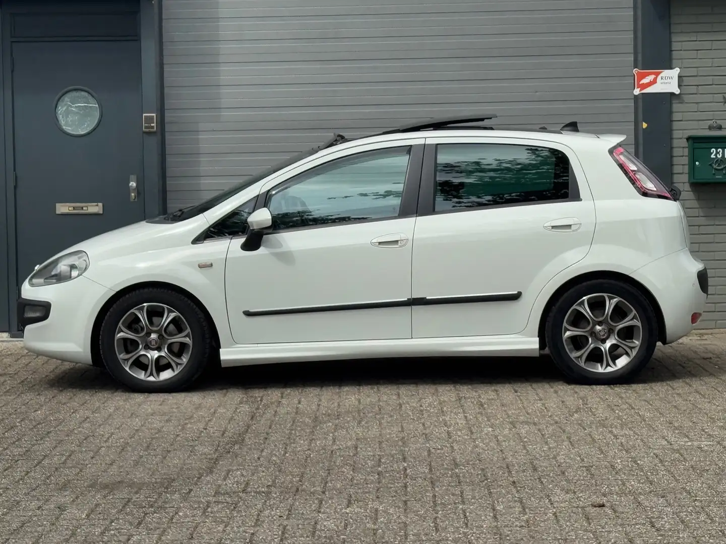 Fiat Punto Evo 1.3 M-Jet Racing, 1ste eigenaar, Panorama dak Wit - 2