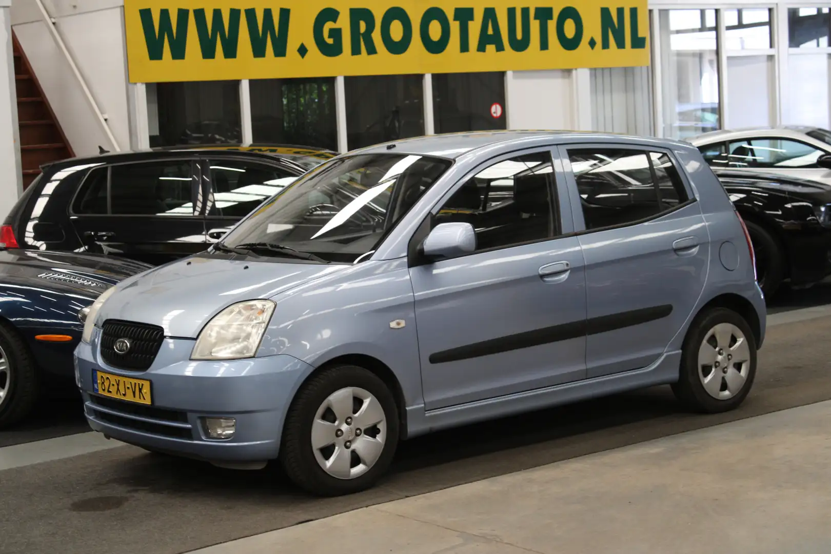 Kia Picanto 1.0 D-light NAP, Airco, 5 Deurs Blauw - 1