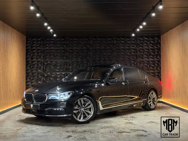 BMW 750 Long 750 dXASL 12 Maanden GARANTIE Individual Pano Skylounge 4x Massage B&W Softclose Luchtvering HUD ACC Laser TV *FULL*