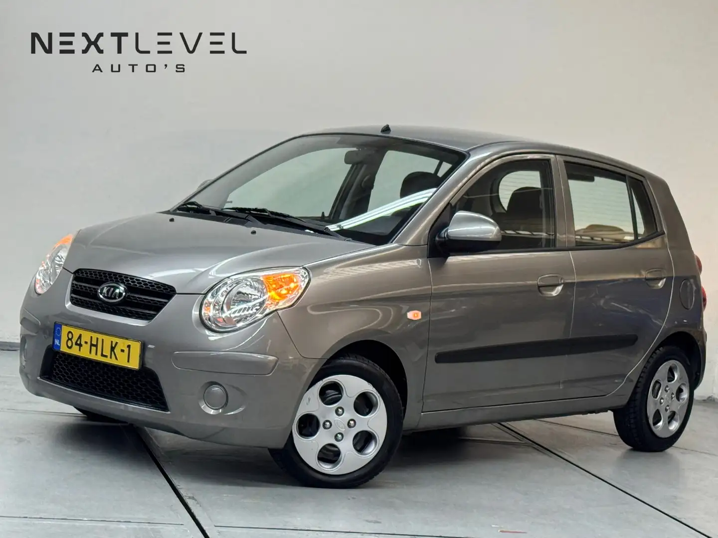 Kia Picanto 1.1 X-tra Automaat Airco Elek Ramen Rijklaar Gris - 1