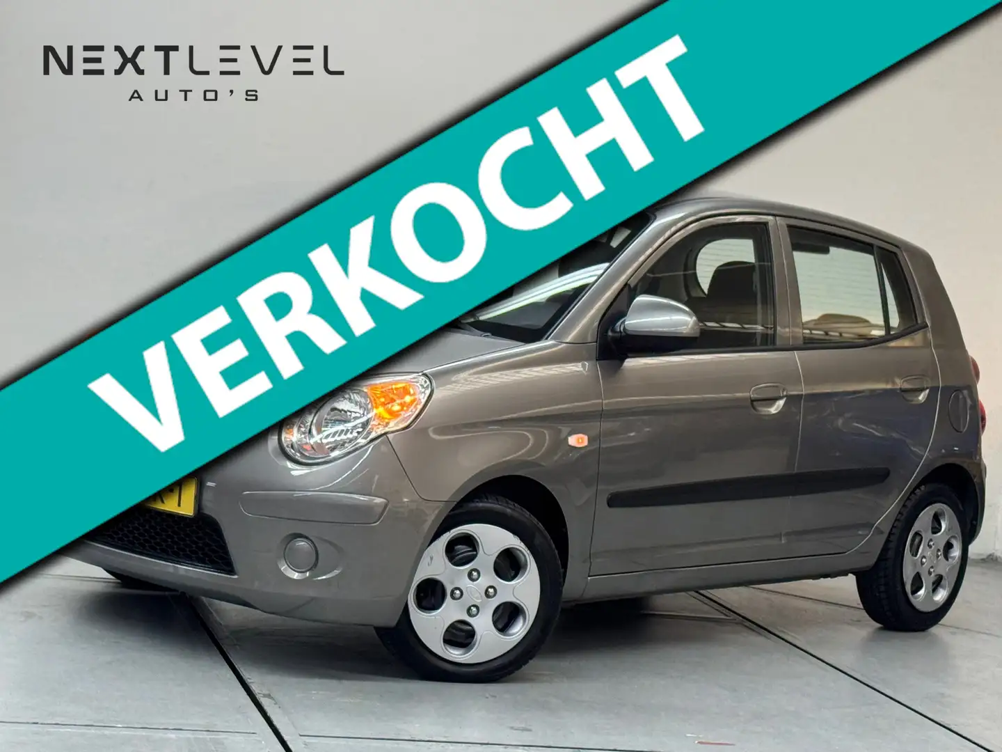 Kia Picanto 1.1 X-tra Automaat Airco Elek Ramen Rijklaar Gris - 1