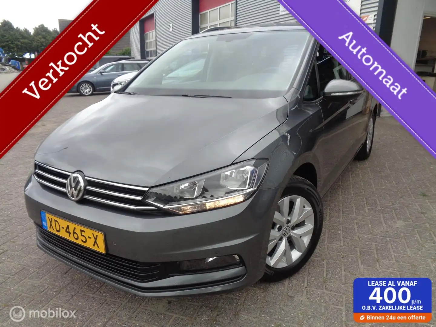 Volkswagen Touran 1.5 TSI Comfortline Business 7p/AUTOMAAT/Airco/Cru Gri - 1