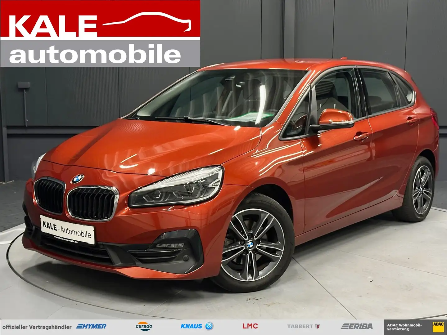 BMW 218 i Active Tourer Sport Line *T-LEDER*NAVI*LED*AHK* Portocaliu - 1