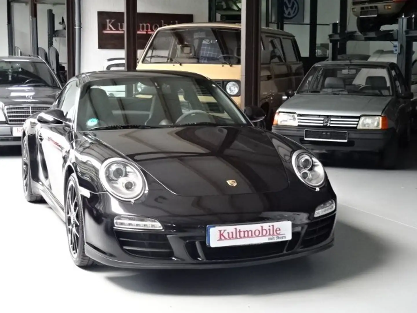 Porsche 997 Carrera 4 GTS Coupe Schwarz - 1