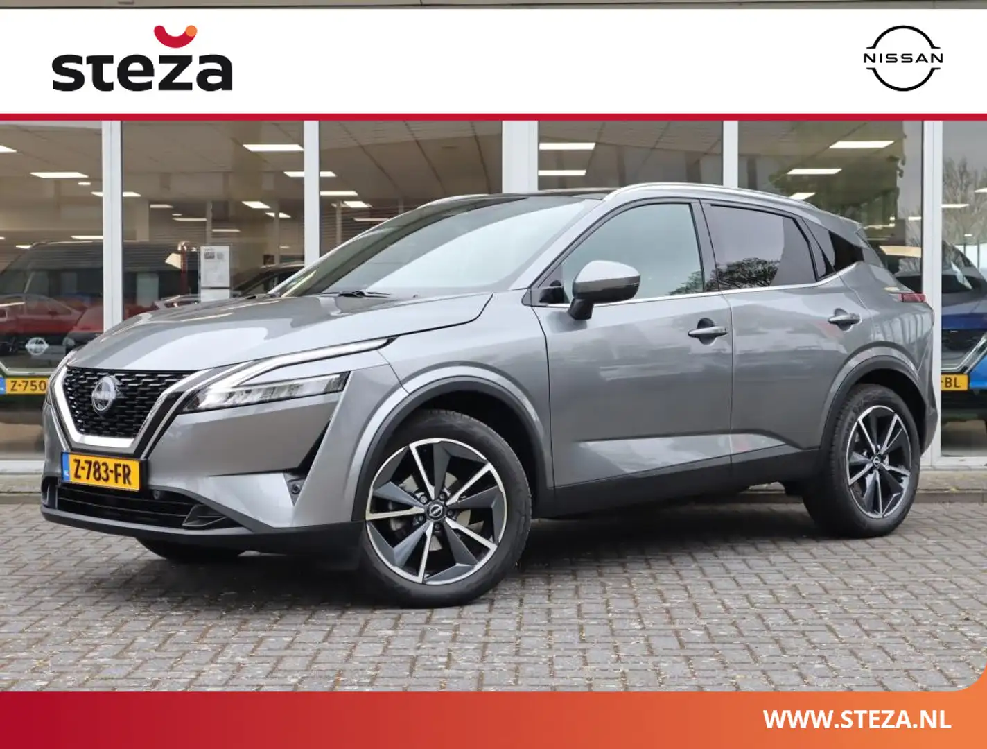 Nissan Qashqai 1.3 MHEV Tekna / Voorruitverwarming / Stoelverwarm Grijs - 1