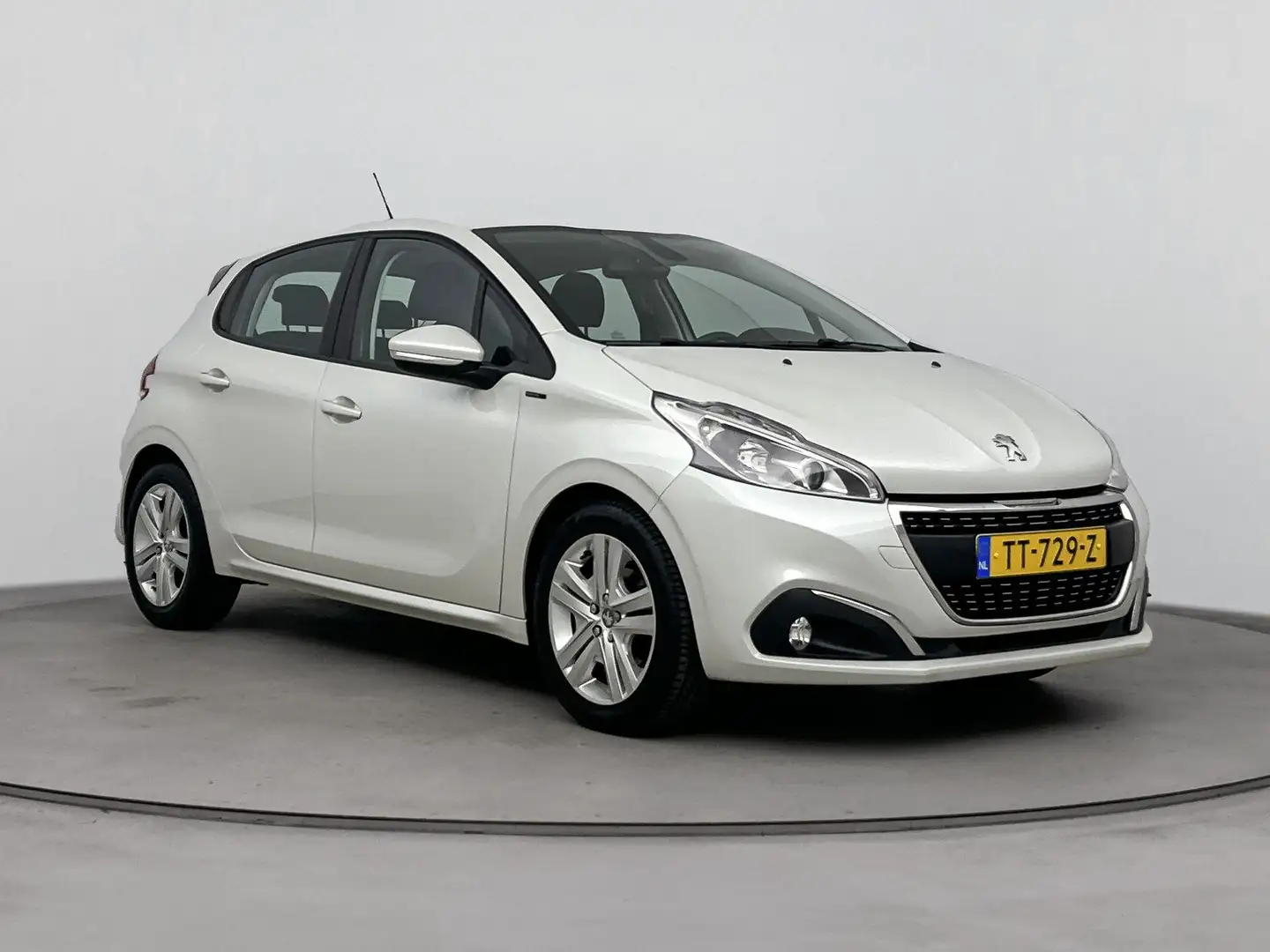 Peugeot 208 1.2 82 pk Signature | Navigatie | Carplay | Parkee Wit - 2
