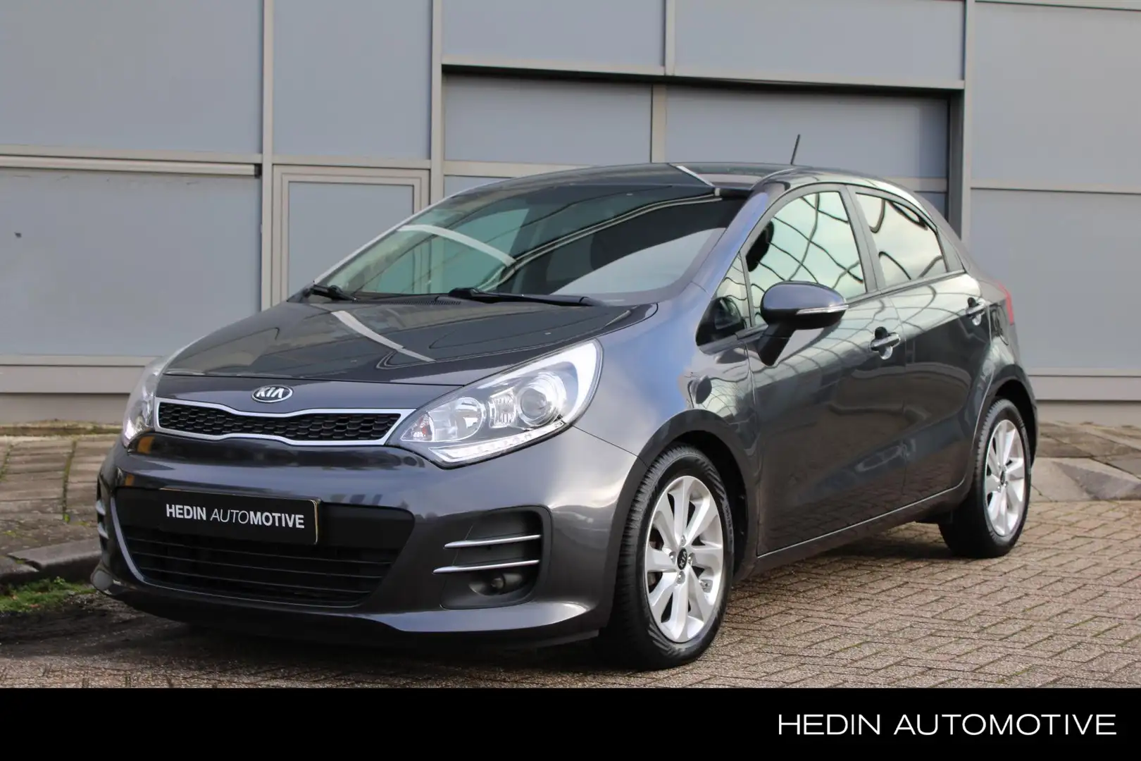 Kia Rio 1.2 CVVT ExecutiveLine | Navigatie | Camera | Stoe Grijs - 1