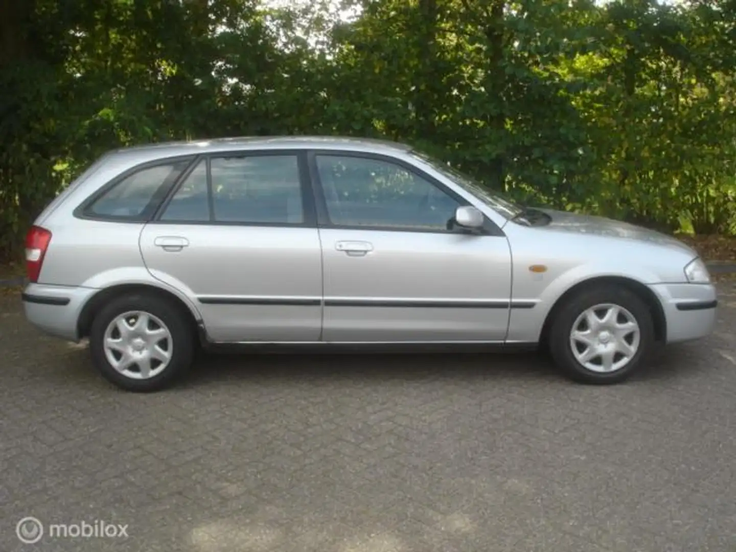 Mazda 323 Fastbreak 1.5 I 65 KW TSI 5 deurs 196973 KM Grau - 2