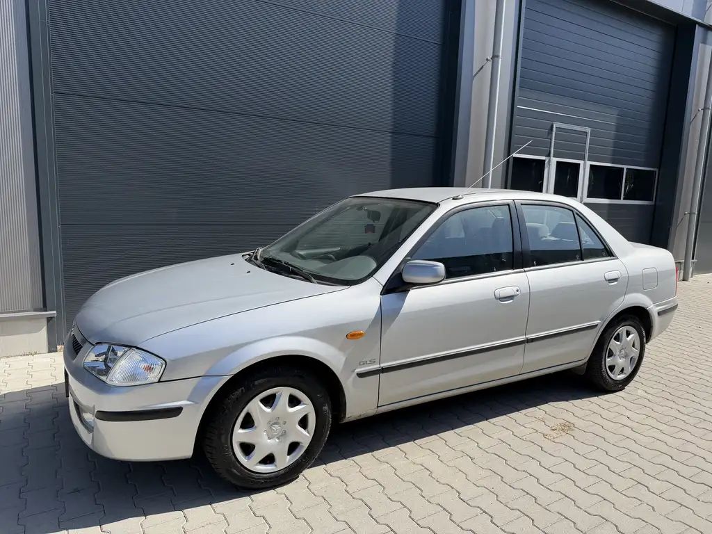 Mazda 323 1999 из Европы — купить под ключ