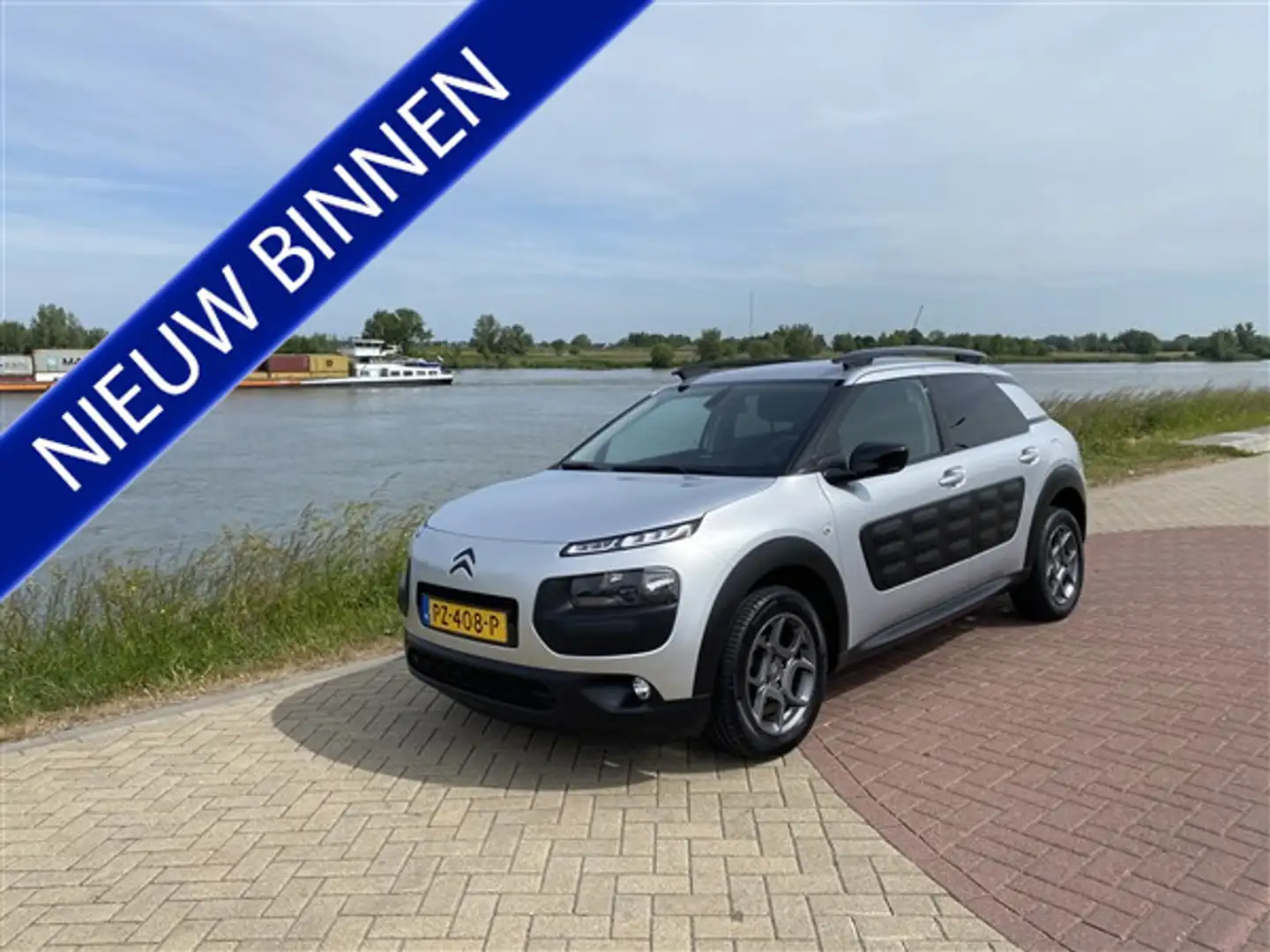 Citroen C4 Cactus 1.2 PureTech Shine AIRCO.LMV.NAVI.CAMARA.CRUISE Grijs - 1