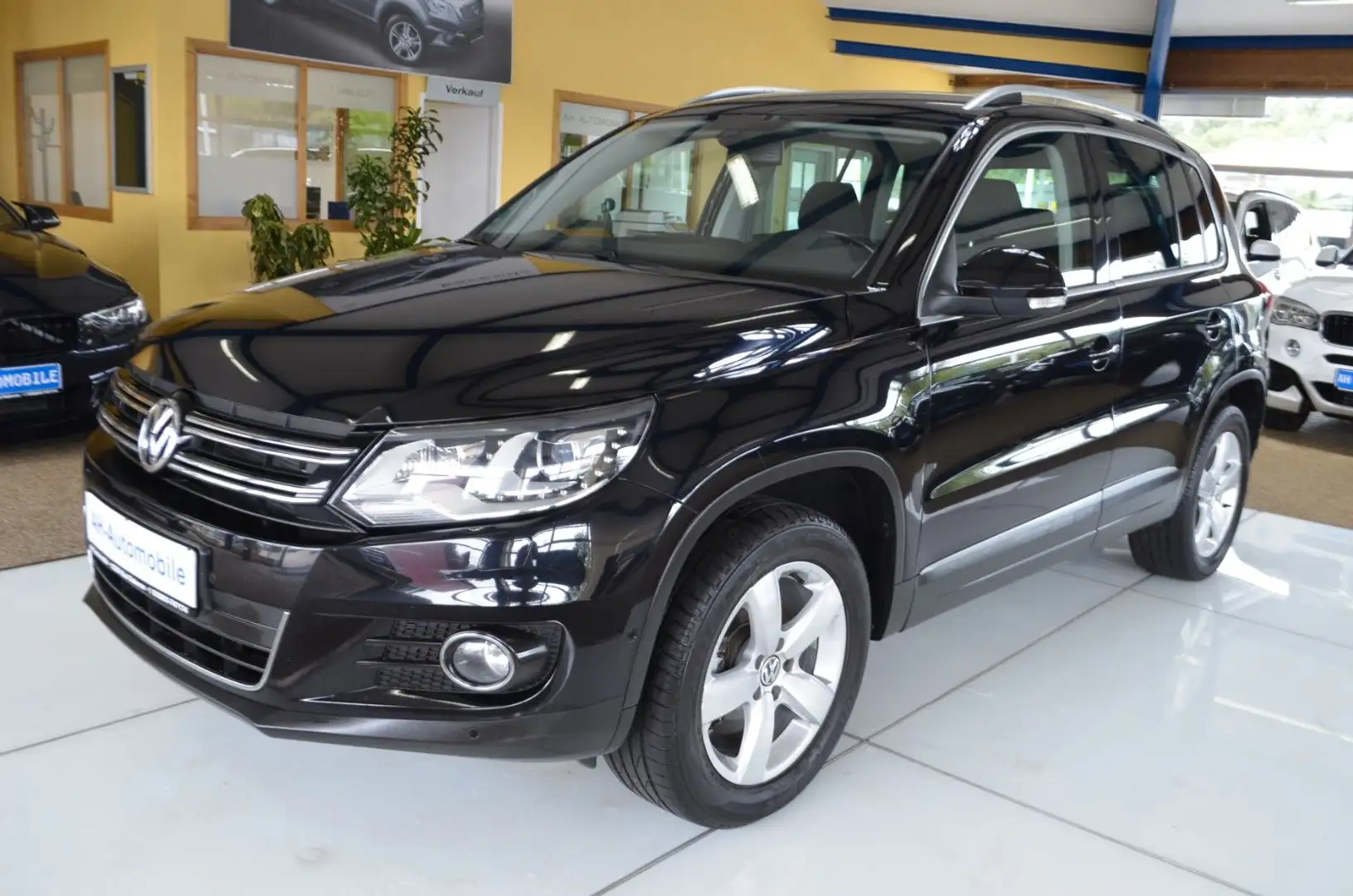 Volkswagen Tiguan Sport & Style 4Motion Bi-XENON / NAVI Schwarz - 1