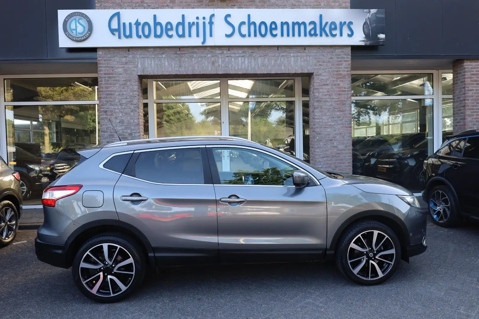 Nissan Qashqai 1.2 Tekna 360-CAMERA LEER RUIT+STUURVERW. 19"LMV D Grijs - 2