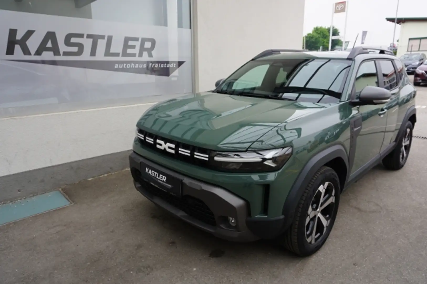 Dacia Duster Journey Hybrid 140 Grün - 1