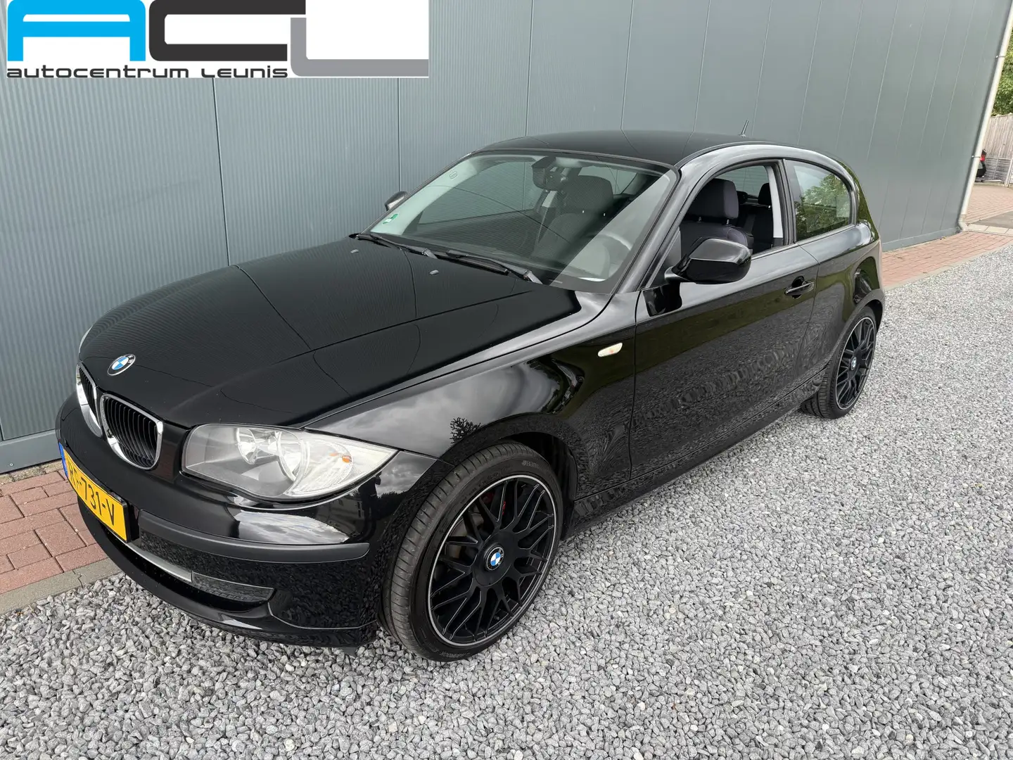 BMW 116 1-serie 116i 2.0 122pk Executive 3-drs Zwart - 1