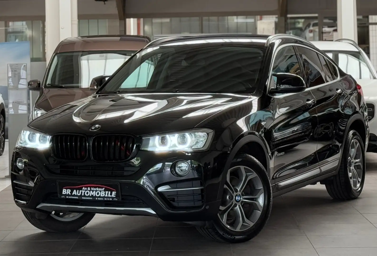 BMW X4 xDrive 20 i xLine*Bi-Xenon*LED-T*Kamera*Navi*SR/WR Fekete - 1