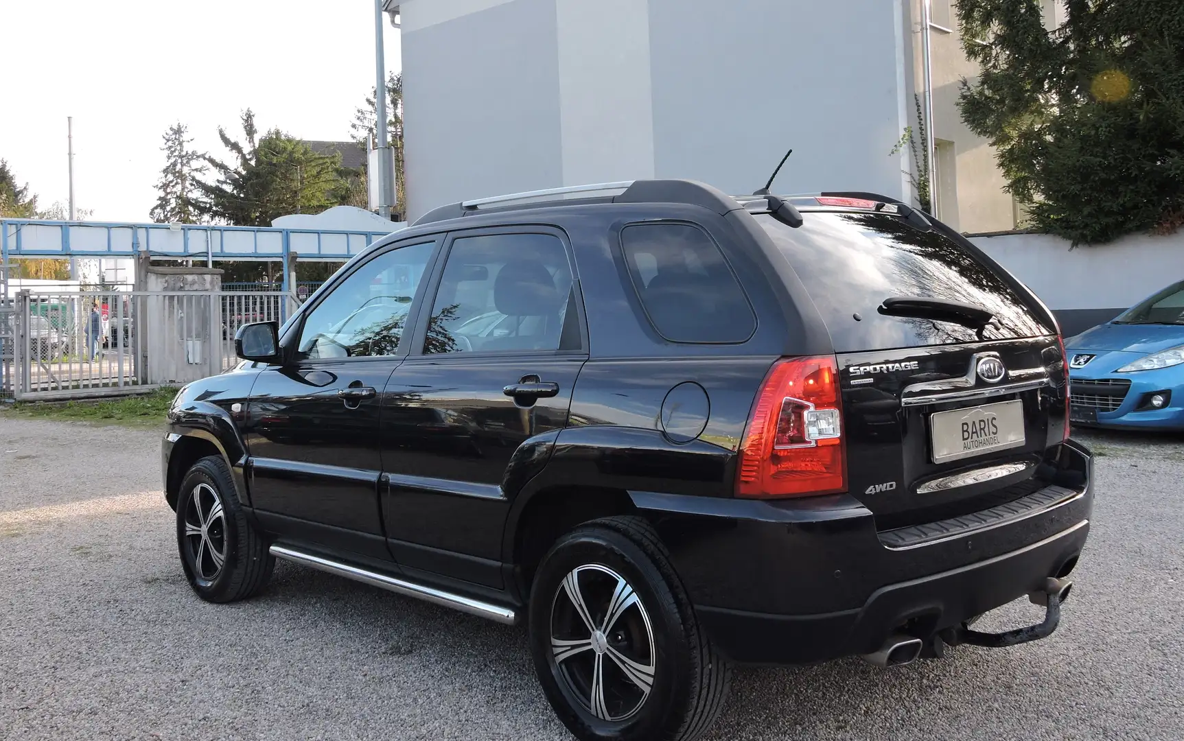 Kia Sportage 2.0 Active Navigator 4WD Schwarz - 1