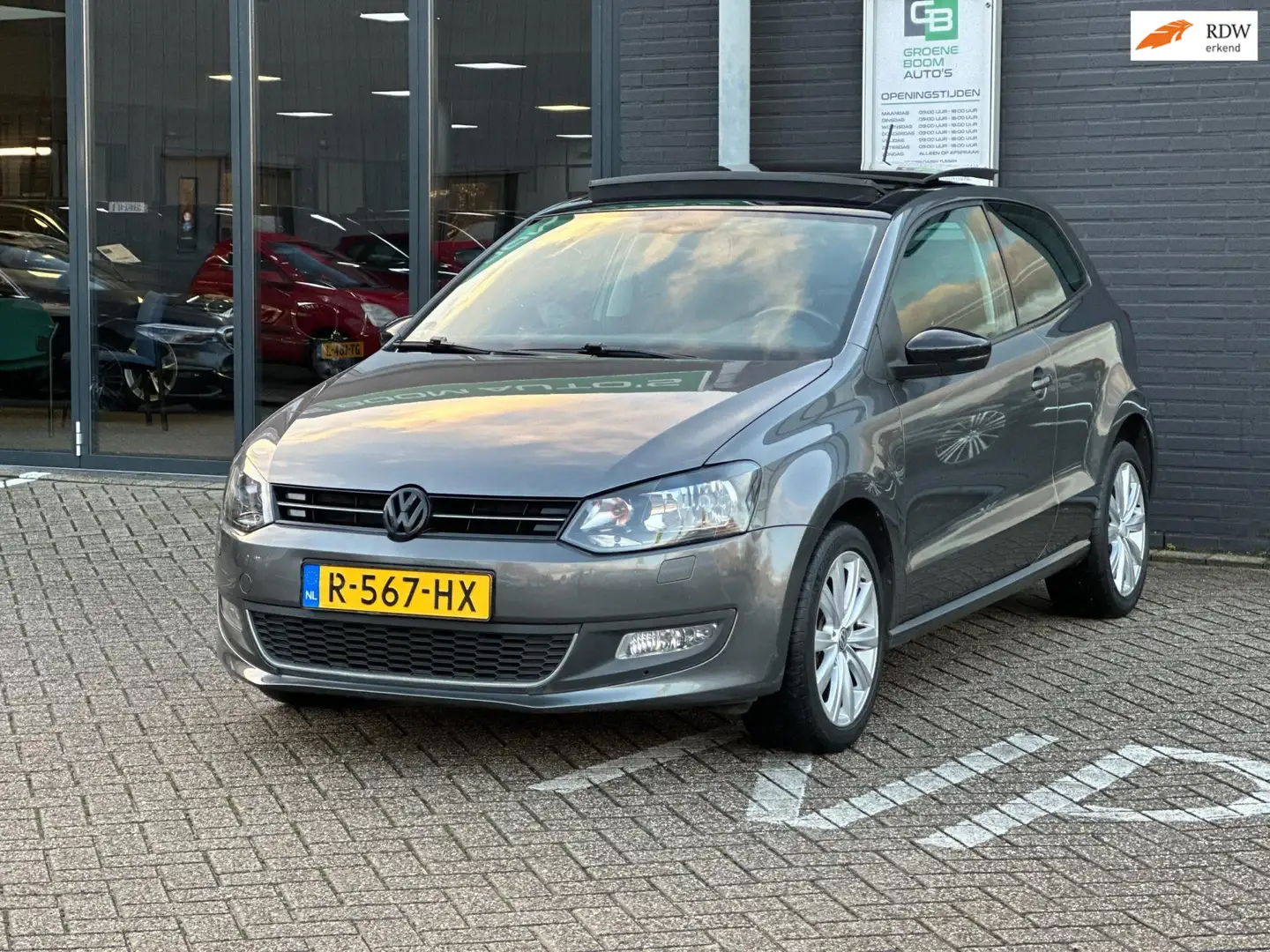 Volkswagen Polo 1.2 Easyline/STOELVERWARMING/PANO-DAK/NAVI/NETEE S Grijs - 1
