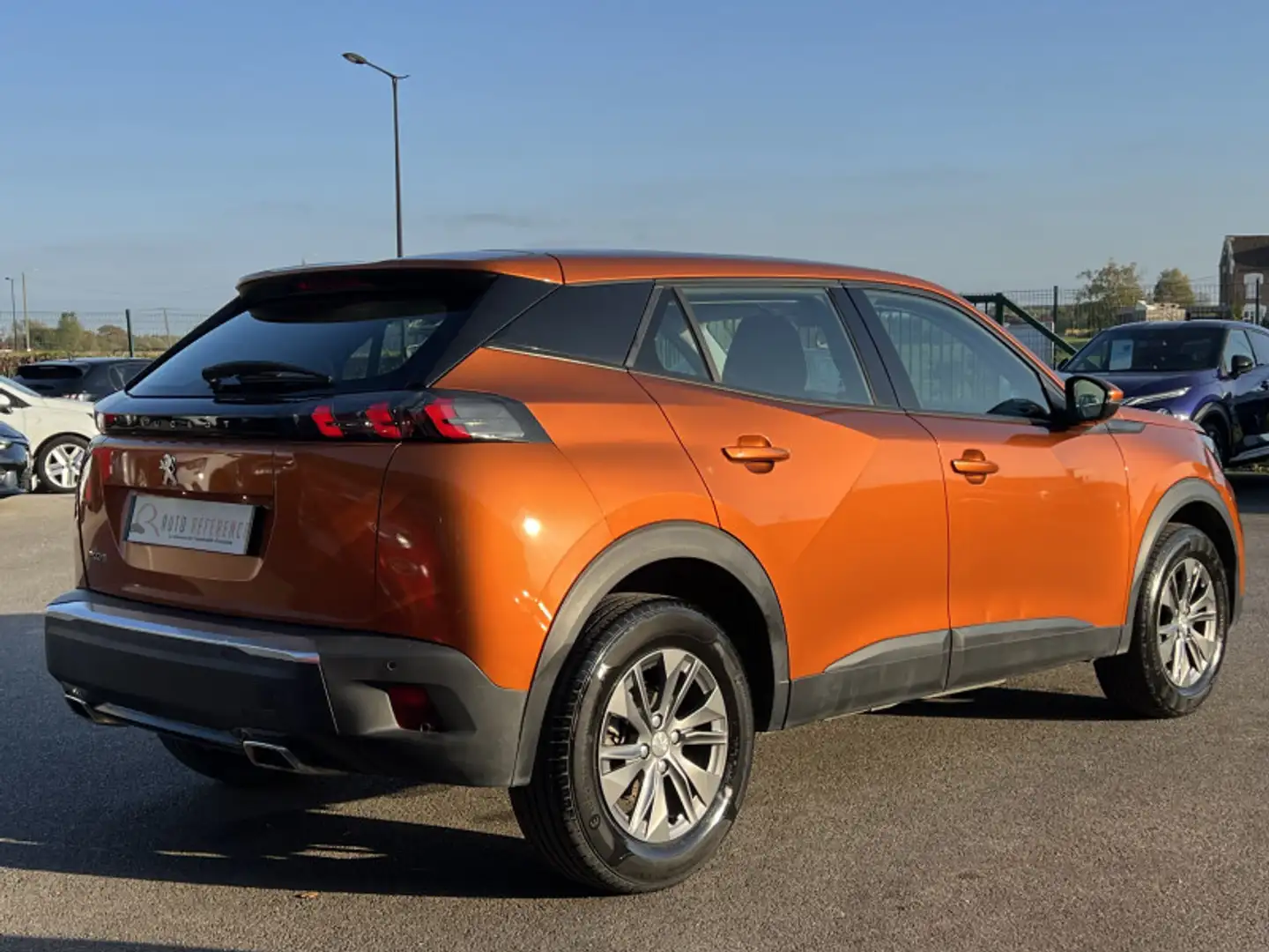 Peugeot 2008 1.2 130 CH EAT8 / CARPLAY / REGULATEUR / CLIM Orange - 2