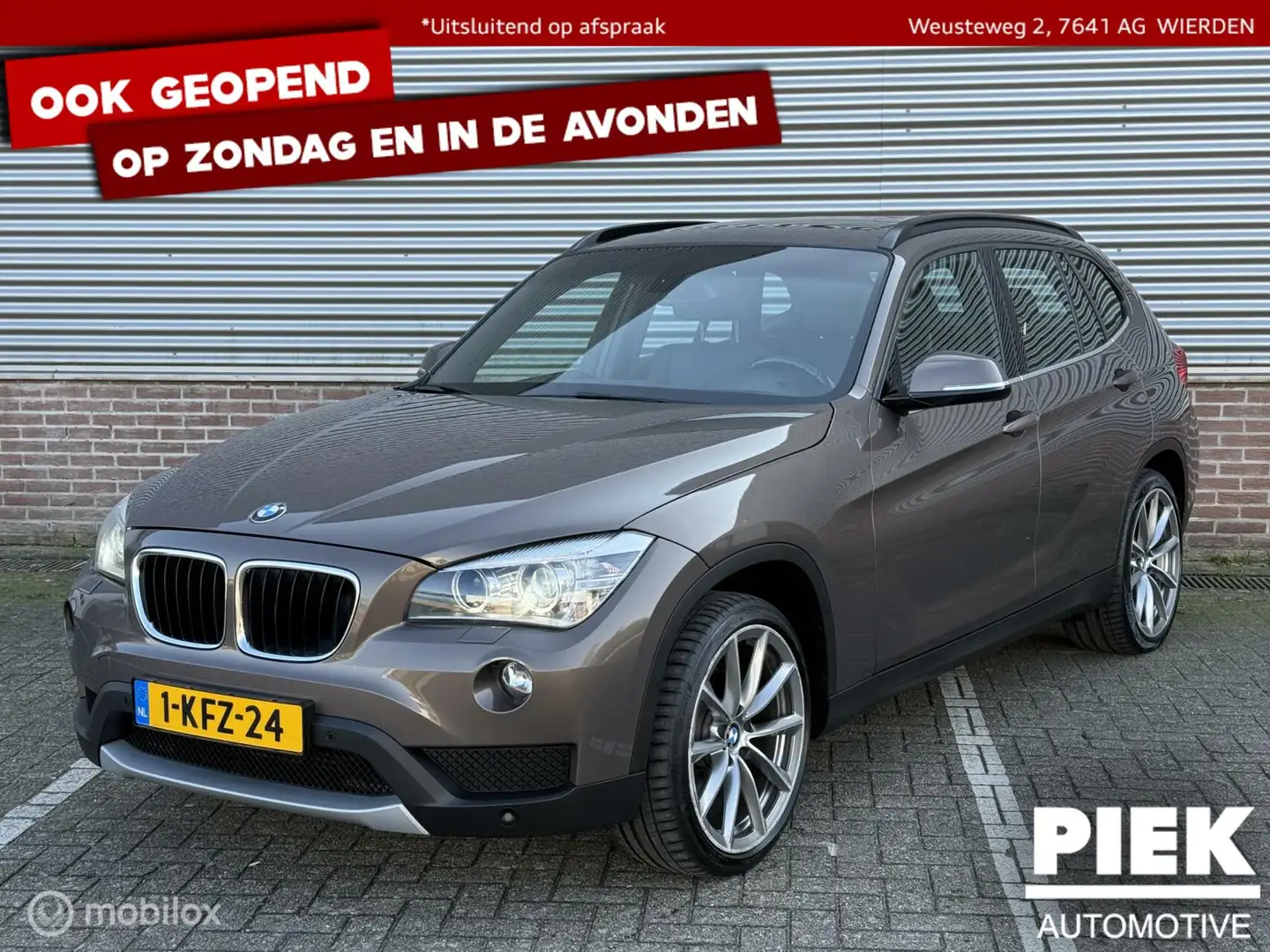 BMW X1 xDrive20i High Executive AUTOMAAT, PANORAMADAK Bruin - 1