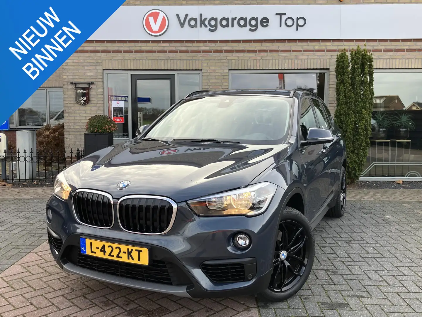 BMW X1 sDrive18i High Executive | Trekhaak | Navi | Stoel Grau - 1