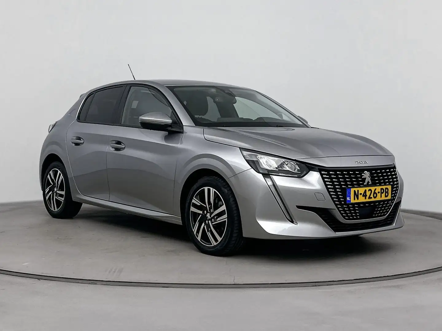 Peugeot 208 1.2 100 pk Allure Pack | Navigatie | Parkeersensor Grijs - 2