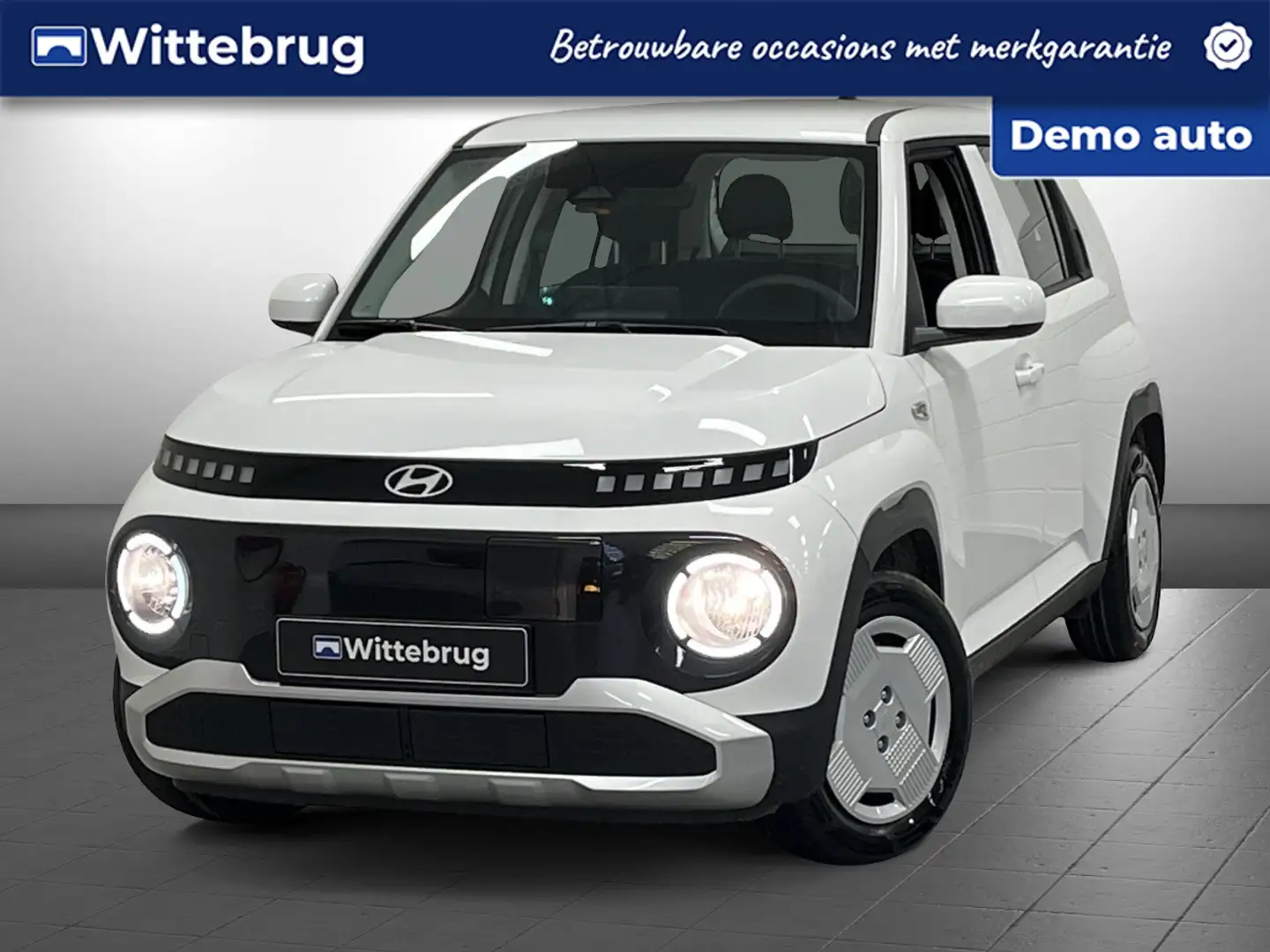 Hyundai Inster E-Motion 49 kWh DEMOVOORDEEL! | NAVIGATIE | PARKEE Weiß - 1