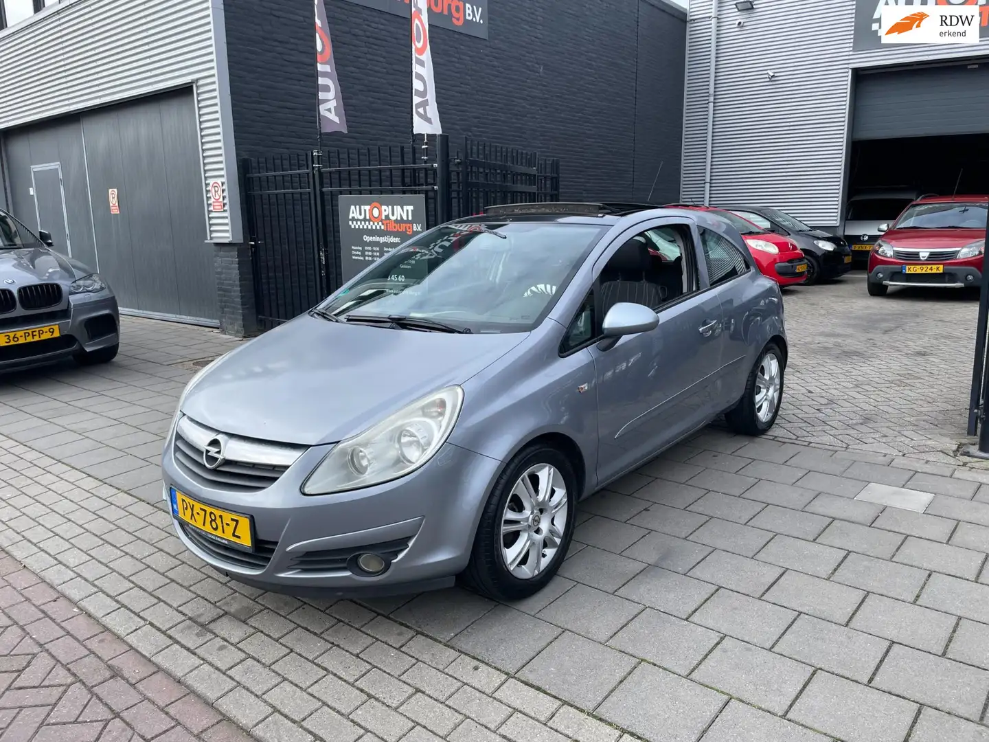 Opel Corsa 1.4-16V Enjoy 1e Eig! Panoramadak Airco NAP APK Grau - 1