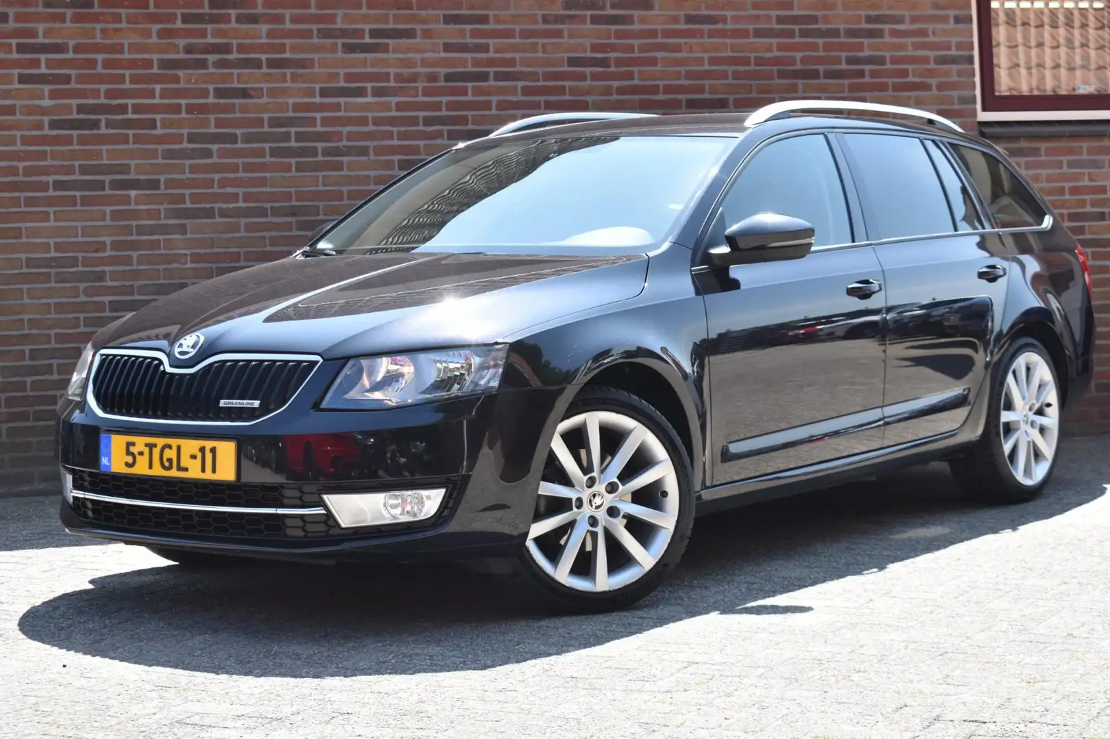 Skoda Octavia Combi 1.6 TDI Greenline Businessline '14 Navi Clim Zwart - 1