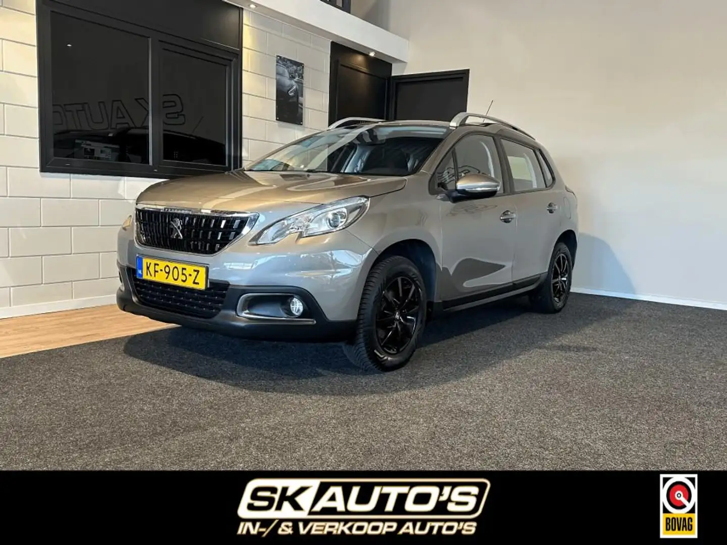 Peugeot 2008 1.2 PURET. BLUE LION NAP l AIRCO l CARPLAY l TREKH Gris - 1