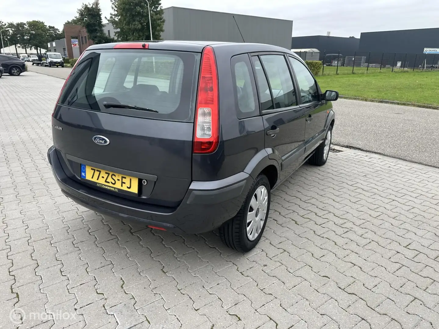 Ford Fusion 1.4-16V Cool & Sound 122.000 km nap Grijs - 2