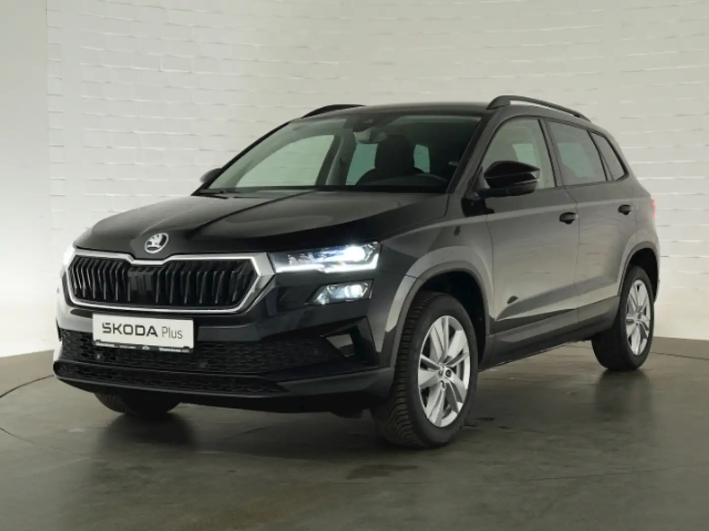 Skoda Karoq SELECTION TSI DSG+NAVI+SITZ-/LENKRADHEIZUNG+LED-SC Schwarz - 2