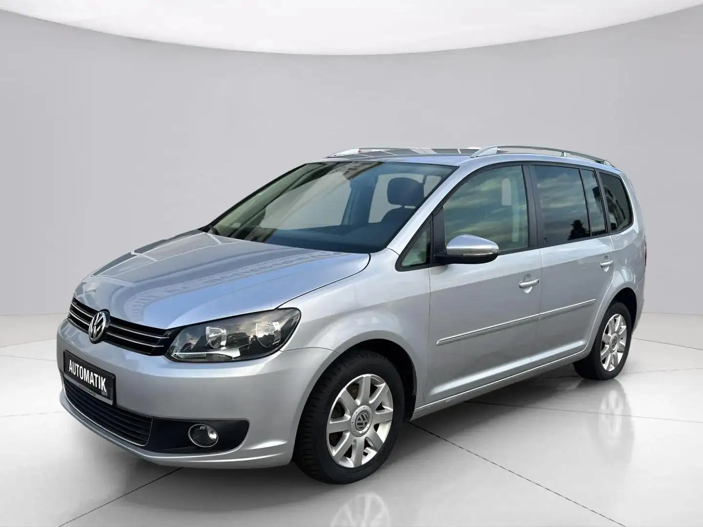 Volkswagen Touran Highline BMT*Automatik*1.Hand*Temp.*Navi*PDC* Zilver - 1