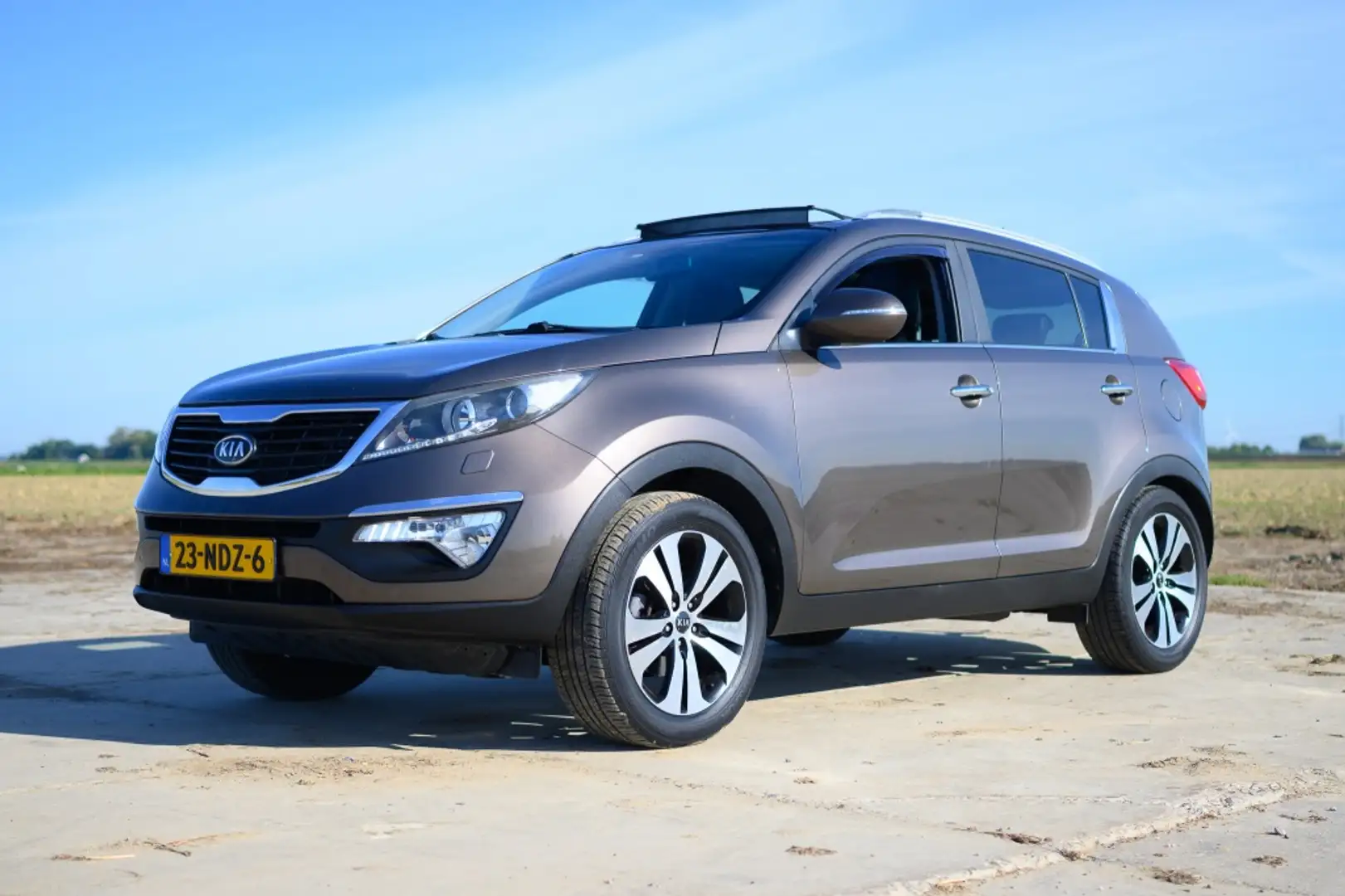 Kia Sportage 2.0 X-clusive First Brun - 1