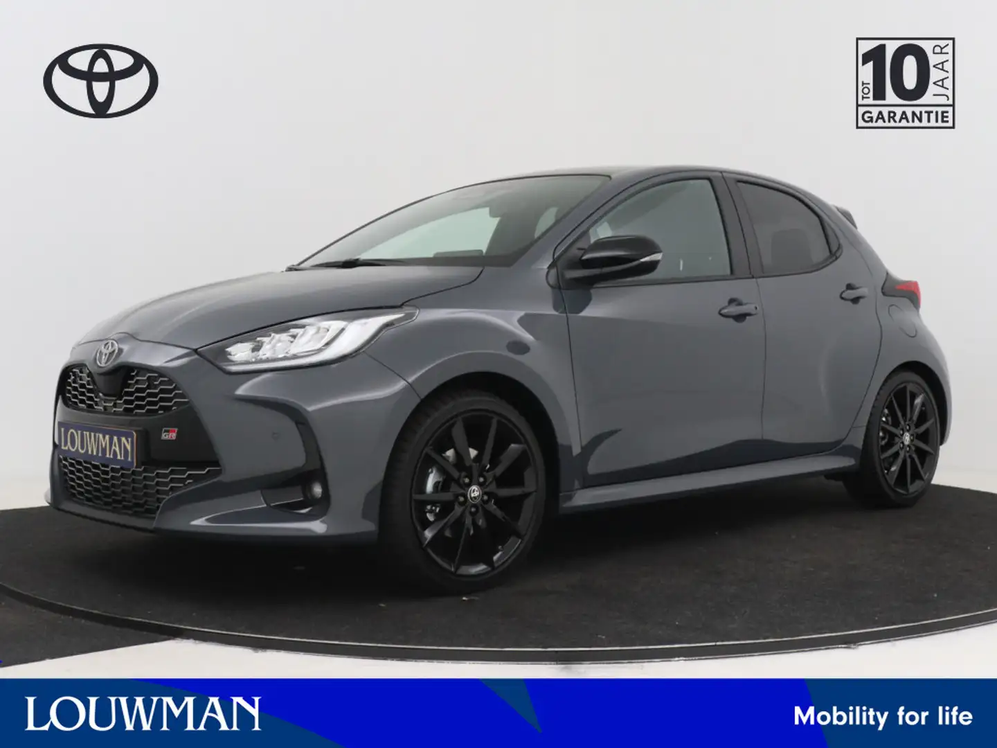 Toyota Yaris 1.5 Hybrid 130 GR Sport | NIEUW & DIRECT LEVERBAAR Grijs - 1