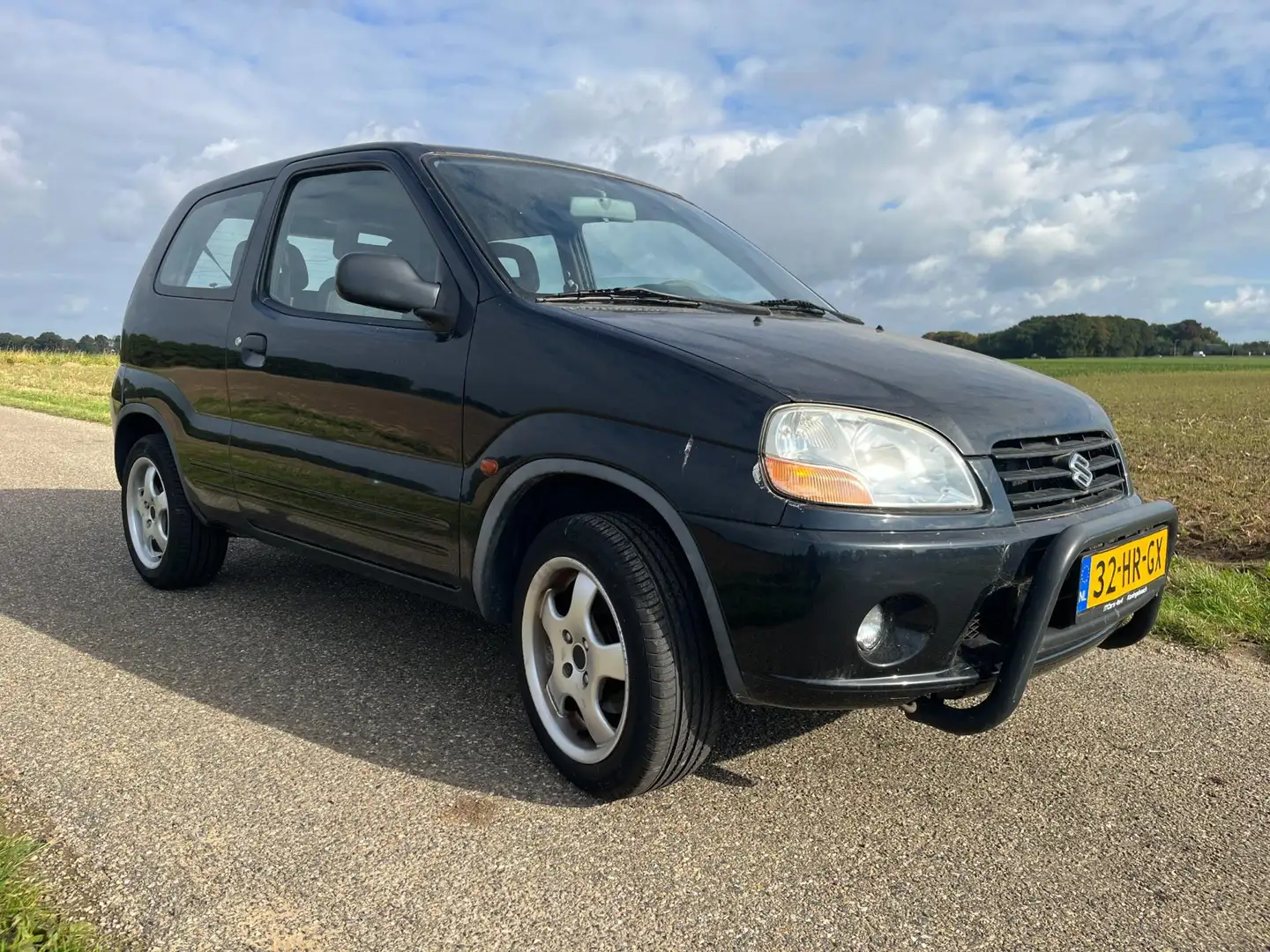 Suzuki Ignis 1.3-16V GS |nwe APK| Zwart - 2