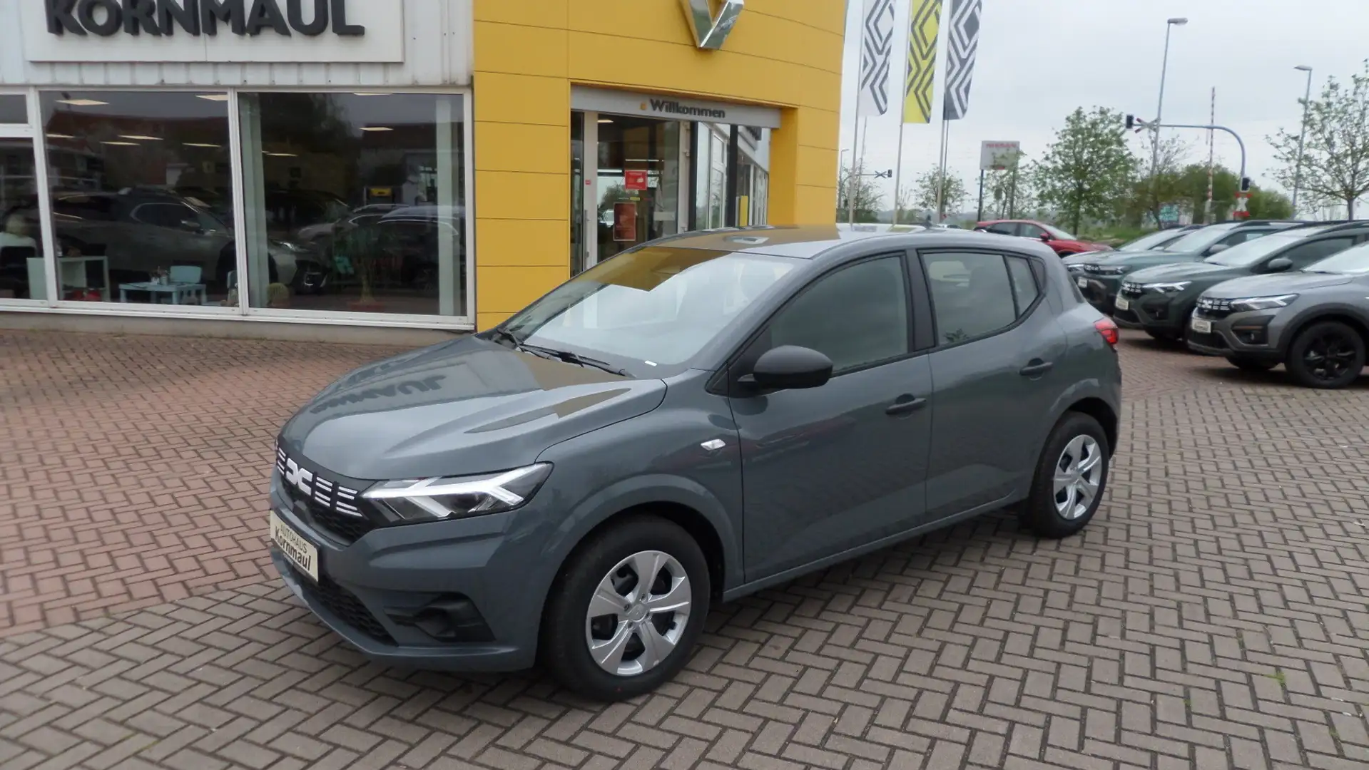 Dacia Sandero III Essential TCe 90 PS mit Klima Einparkhilfe hin Grijs - 1