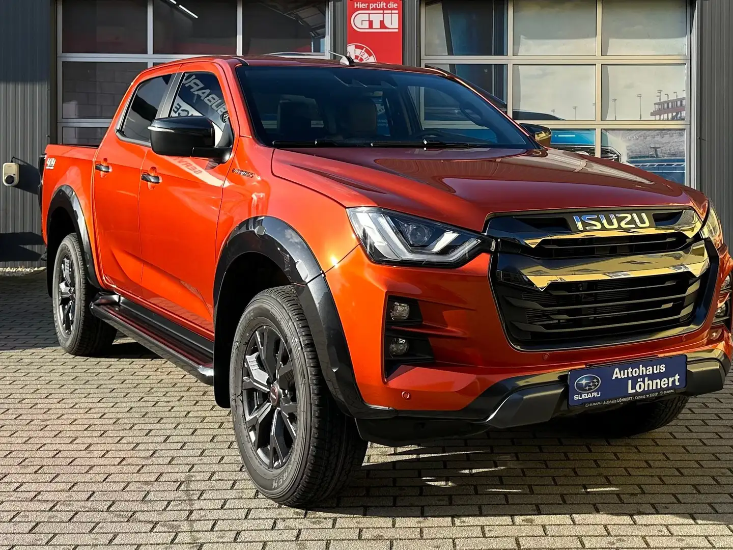 Isuzu D-Max Double Cab 4WD Autm. V-Cross "Aktionspreis" Orange - 1