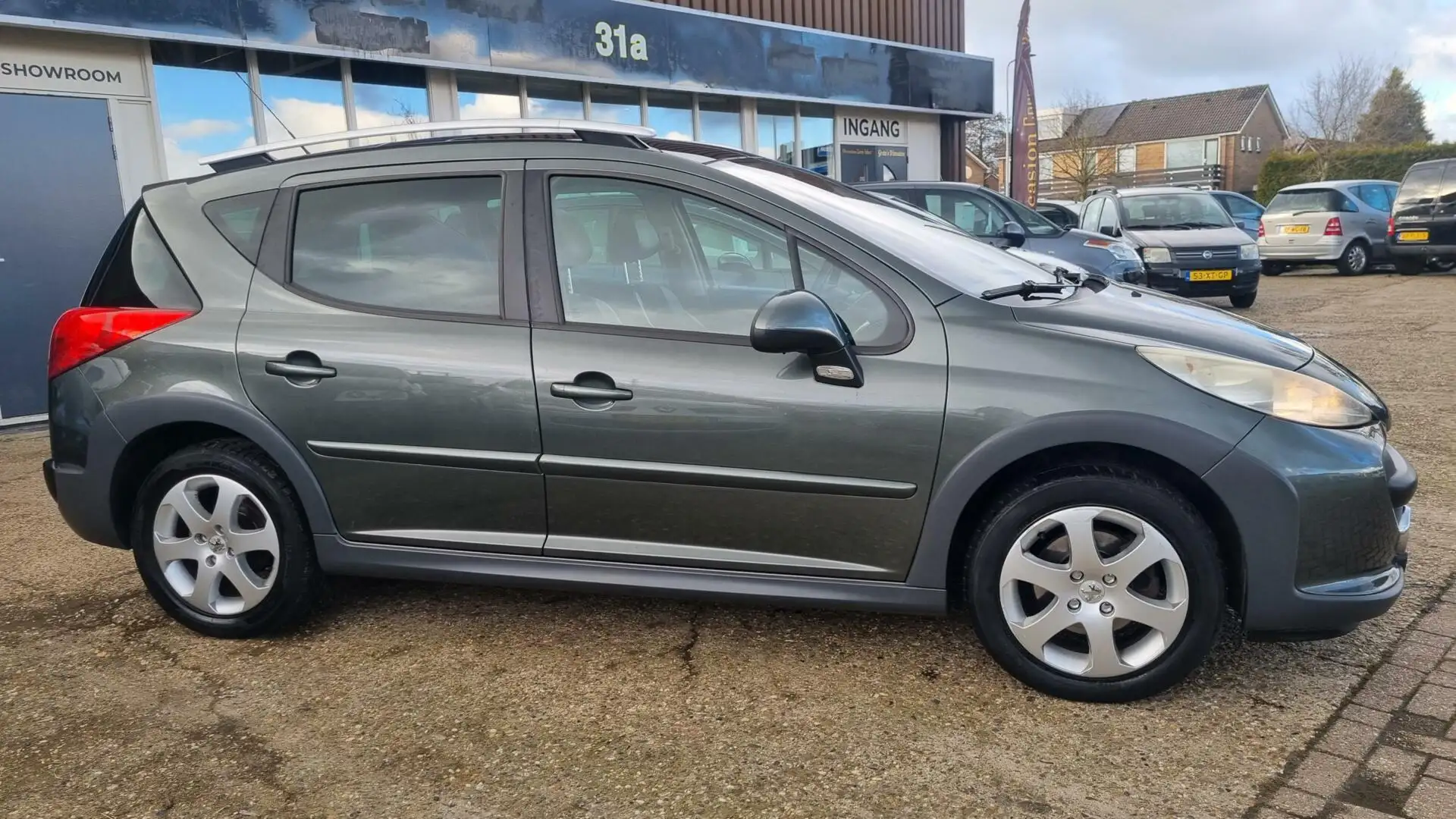 Peugeot 207 SW Outdoor 1.6 VTi Sublime Grijs - 2