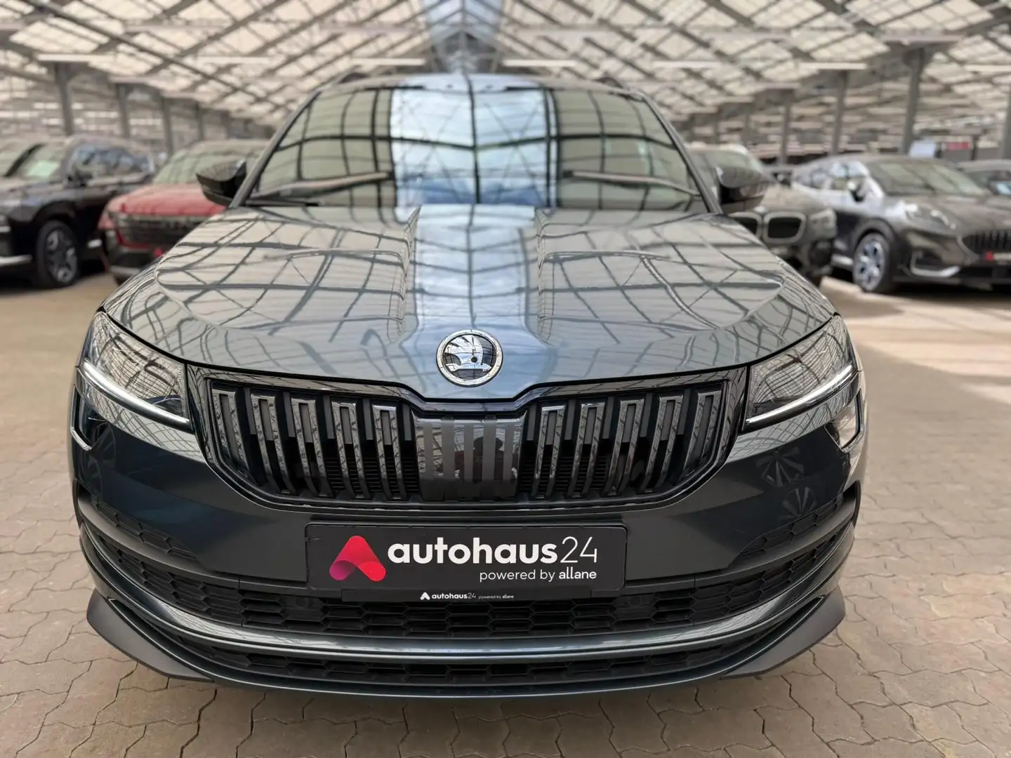 Skoda Karoq 1.5 TSI Sportline LED|Navi|ParkPilot|DAB Grijs - 2