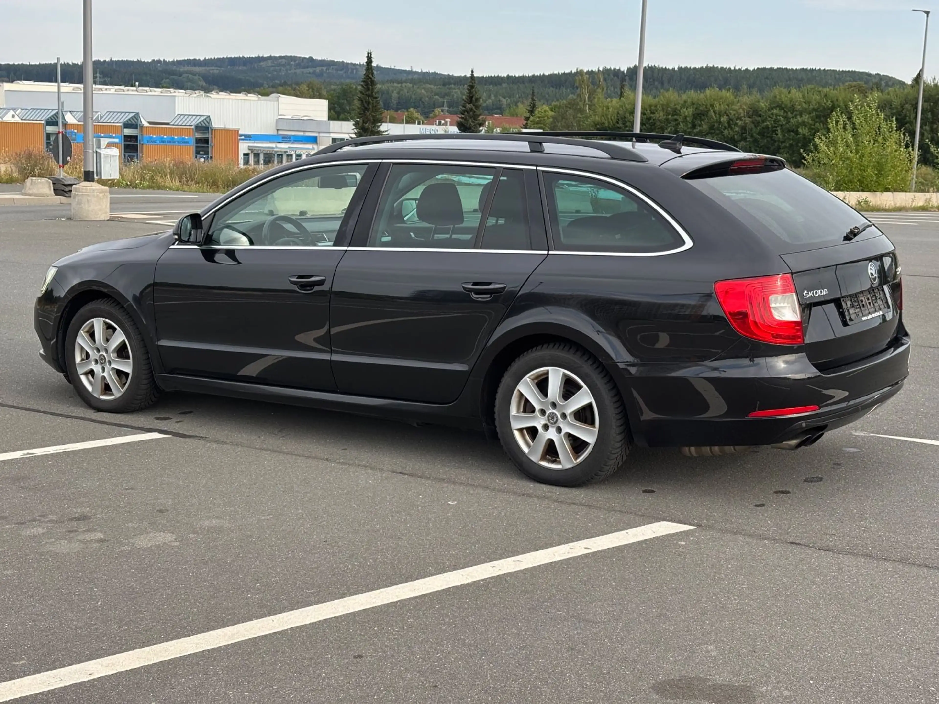 Skoda Superb 2.0 TDI DSG Combi Exclusive — photo 6