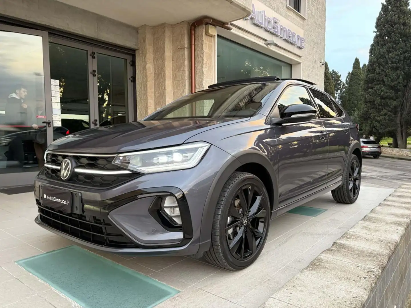 Volkswagen Taigo 1.0 TSI 116 CV DSG R-Line TETTO APR/PAN Grijs - 1