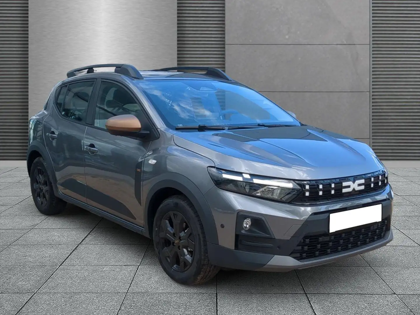 Dacia Sandero Stepway Extreme SHZ+LKHZ+Navi+RFK TCe 110 81 kW... Grau - 1