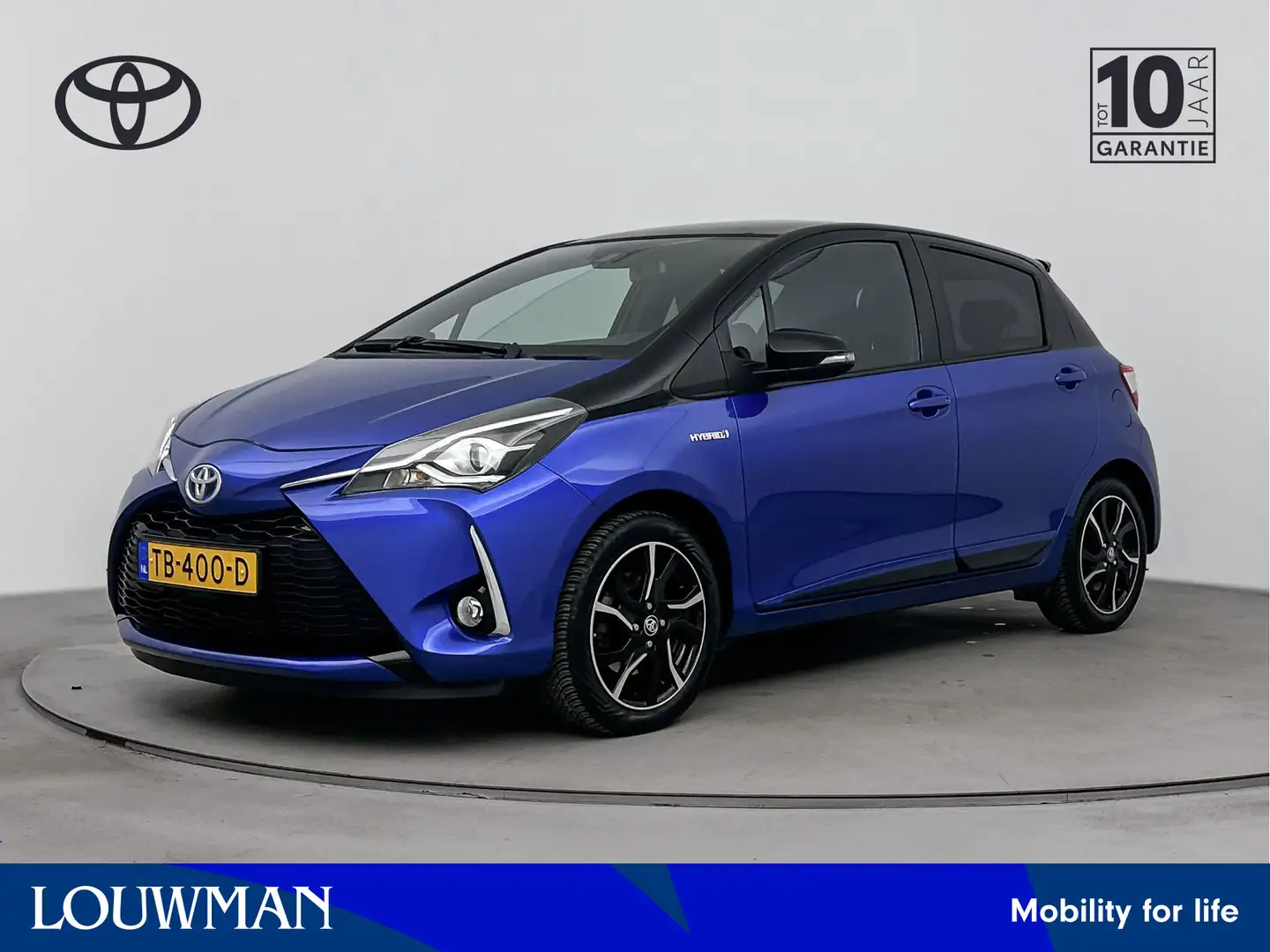 Toyota Yaris 1.5 Hybrid Bi-Tone Plus | Panoramadak | NL-Auto | Blauw - 1