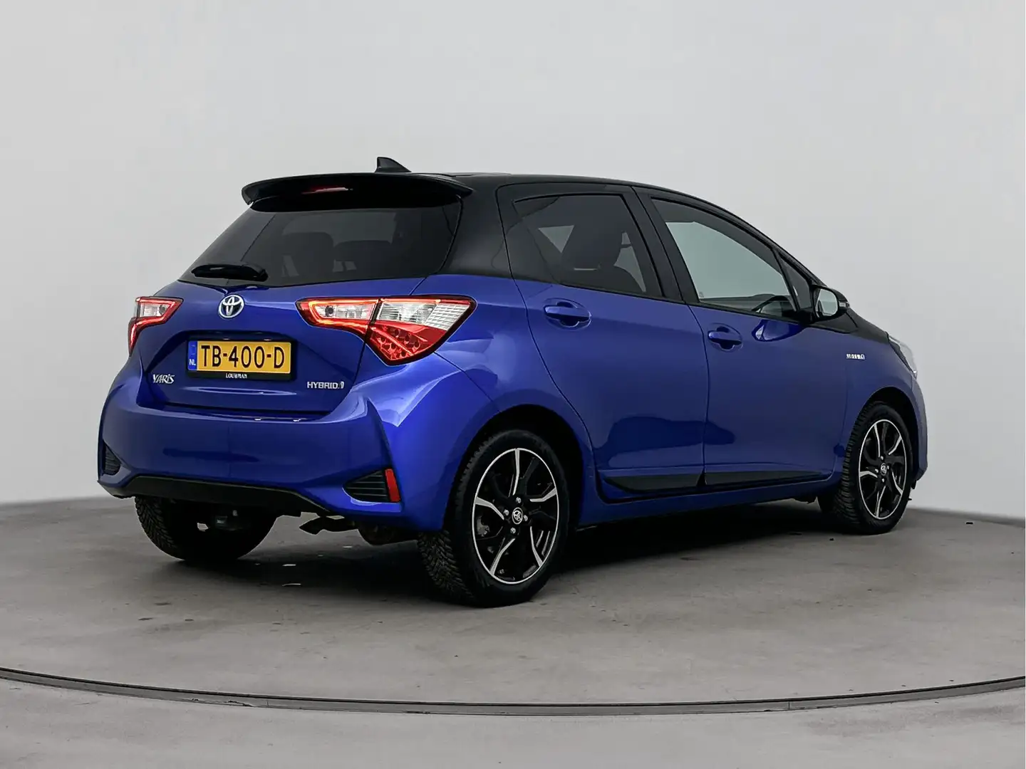 Toyota Yaris 1.5 Hybrid Bi-Tone Plus | Panoramadak | NL-Auto | Bleu - 2