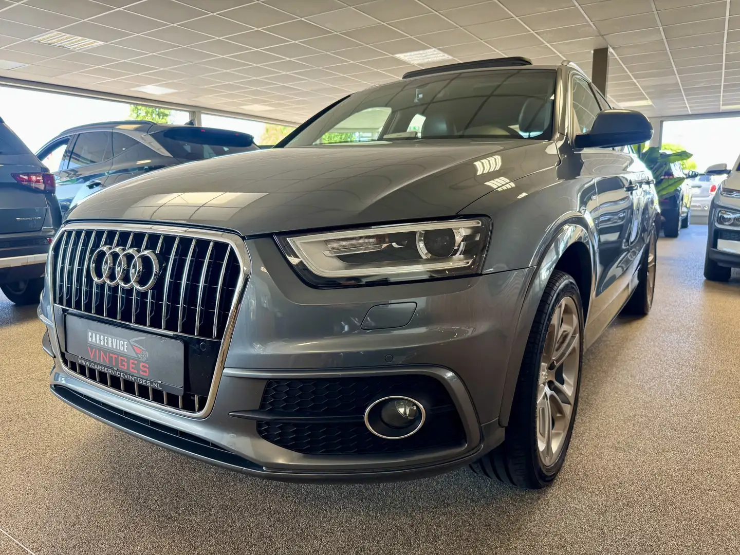 Audi Q3 2.0 TFSI quattro Pro Line S-line, Pano, 19"inch, C Grijs - 1