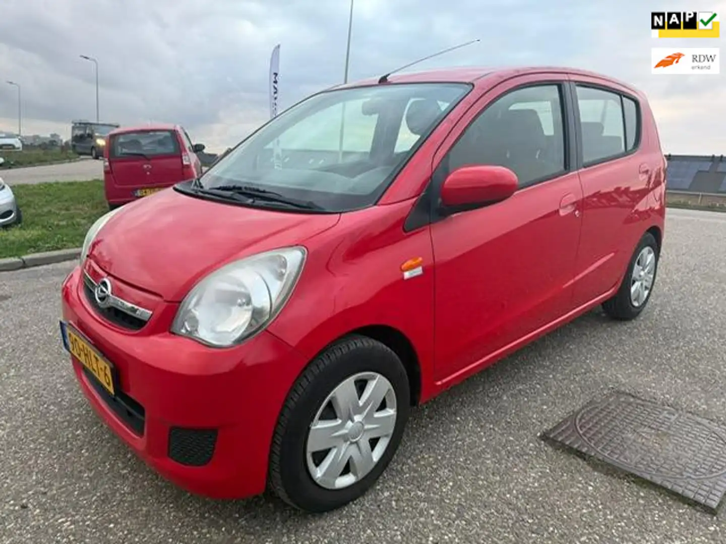 Daihatsu Cuore 1.0 Premium Dealeronderhouden Airco NAP 81xxx 1Eig Rood - 1