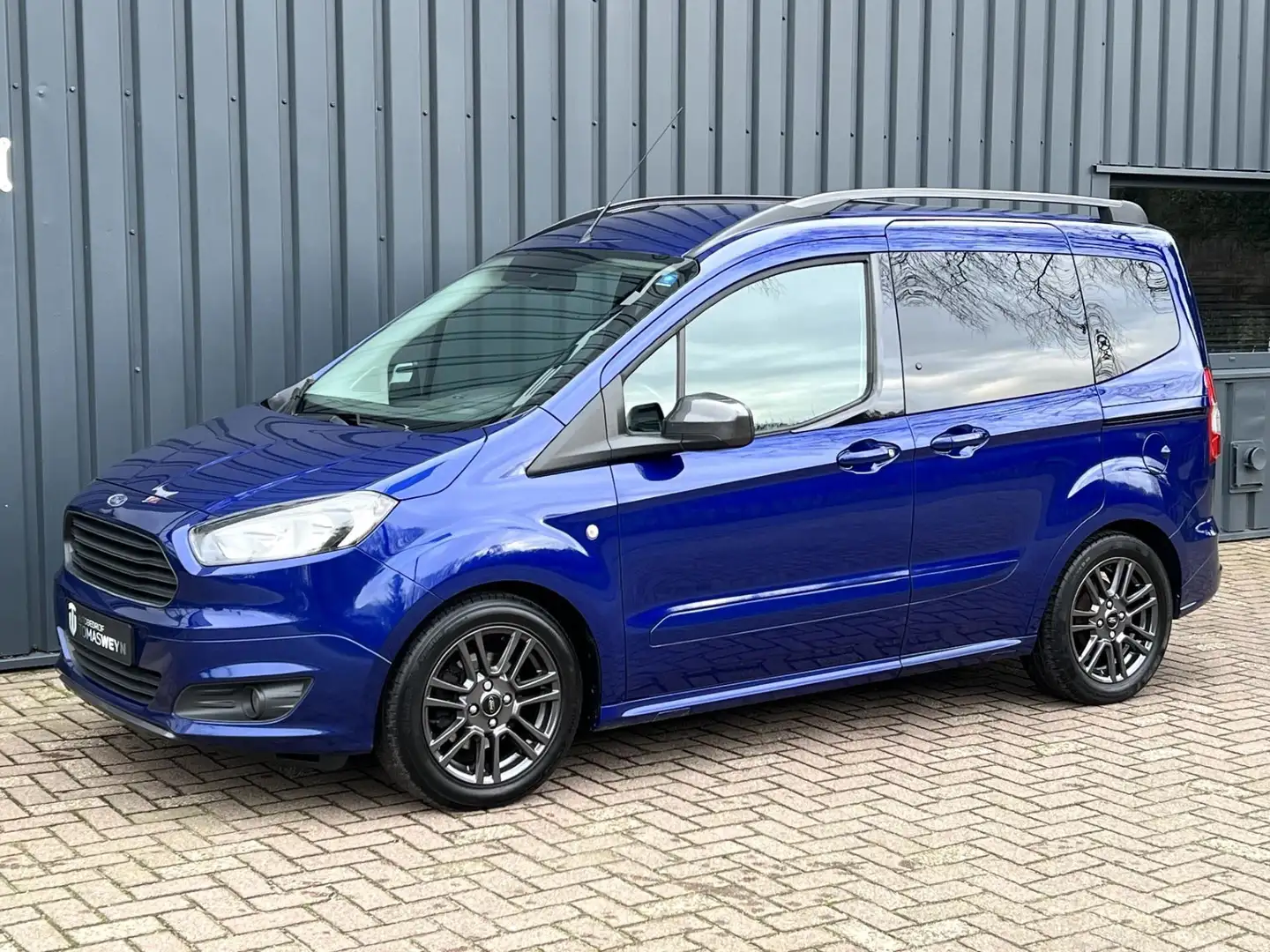 Ford Tourneo Courier 1.0 Titanium NAVIGATIE!/CLIMA!/UNIEK!/ Blauw - 1