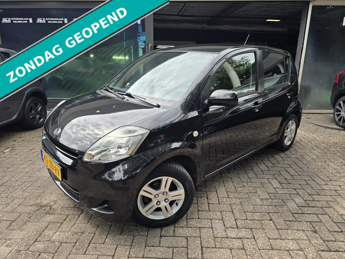 Daihatsu Sirion 2 1.0-12V Premium | 1E EIGENAAR |3/6 OF 12MND GARA Schwarz - 1